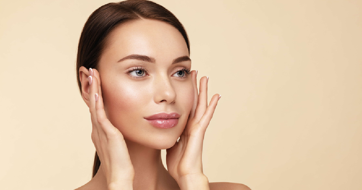 A women showing her glowing face after Aquagold® Fine Touch™ treatment in Fort Myers, FL